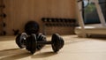 Dumbbells on the fitness floor, close-up image. Fitness gym training sport equipments concept