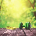 Dumbbells and measuring tape for healthy care on green nature background. Healthy Lifestyle. Blurred effect. Generative