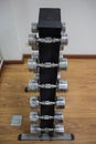 dumbbells set on rack in workout room