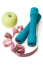 Dumbells, apple and measuring