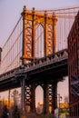 DUMBO. The Empire State Building visible through the support of the Manhattan Bridge Royalty Free Stock Photo