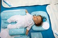 Dummy of Child lies in crib. Top view. Royalty Free Stock Photo