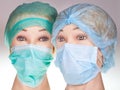 Dummy doctor heads wearing textile surgical cap and mask