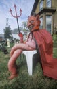 Dummy Dressed as the Devil for Halloween on Front Lawn, Illinois