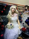 Dummy of a young girl in a wedding dress in a shop window Royalty Free Stock Photo