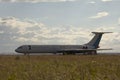 Dump of aircraft - old soviet civil passenger airplane in dield at summer day Royalty Free Stock Photo