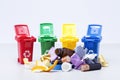 Dump and garbage containers in different colors.