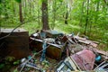 Dump old metal objects in the woods, rusty scrap metal. Environ