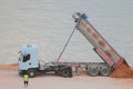 Dump truck on construction of pier. Palma-de-Mallorca, Spain Royalty Free Stock Photo