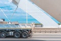 Dump truck crossing the bridge, industry and transportation concept