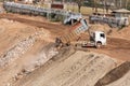 Dump truck is dumping rock. Royalty Free Stock Photo