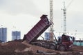 Dump truck is dumping sand Royalty Free Stock Photo