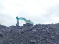 Dump Truck and Excavator Worker mining metal Tantalum and silver. Mining business, Mineral Resources.