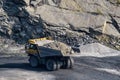 Dump truck in limestone mining, heavy machinery. Mining in the quarry