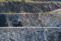 Dump truck in limestone mining, heavy machinery. Mining in the quarry