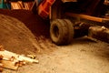 Dump Truck Unloading Soil at Construction. Royalty Free Stock Photo