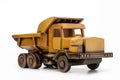 Dump truck yellow toy car made of wood. Royalty Free Stock Photo