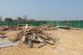 The dump of wood in green zinc wall Royalty Free Stock Photo