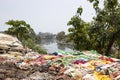 Dumped garbage on the banks of meeti river bank in Kalina area Royalty Free Stock Photo