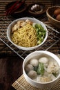 Dumpling meatball chicken noodle. Boiled noodles served with pieces of chicken meat, meatballs, dumplings, leeks, celery and broth Royalty Free Stock Photo