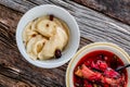 Dumplings with borscht on rustic table Royalty Free Stock Photo