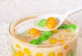 Dumplings in coconut cream Bua Loi on Thai silk Royalty Free Stock Photo