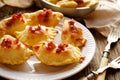 Dumplings with curd and potato stuffing sprinkled with pork greaves on a white plate, Royalty Free Stock Photo