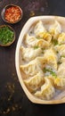 dumplings Delicious manti showcased appetizingly against dark backdrop