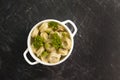 Dumplings, dill on concrete background homemade cuisine Royalty Free Stock Photo