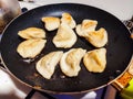 Dumplings fried in a pan