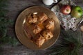 Dumplings on Gold Plate with Greenery on Rustic Wood Royalty Free Stock Photo