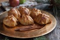 Dumplings on Gold Plate with Greenery on Rustic Wood Royalty Free Stock Photo