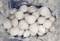 Dumplings inside packaging close-up, frozen homemade russian pelmeni