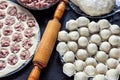 Dumplings, meat, rolling pin, dough. Royalty Free Stock Photo