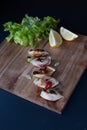 Dumplings styled with lemons and green lettuce