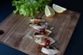 Dumplings styled with lemons and green lettuce