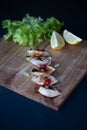 Dumplings styled with lemons and green lettuce