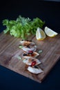 Dumplings styled with lemons and green lettuce