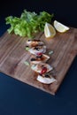 Dumplings styled with lemons and green lettuce