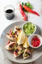 Dumplings styled with lemons green onion and red chili