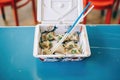 dumplings in a takeout box with disposable chopsticks Royalty Free Stock Photo