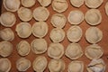 Dumplings on a wooden board. Top view on wooden table with homemade food. Uncooked handmade dumplings on a wooden plate