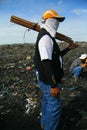 Dumpsite worker Royalty Free Stock Photo