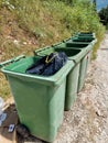 dumpster litters garbage rubbish bins plastic trash thrown Royalty Free Stock Photo