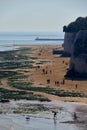 Dumpton, UK - April 29 2023 - People walking on the beach between Broadstairs and Ramsgate