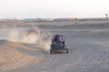 Dune Buggies Racing In Desert