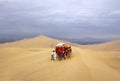 Dune buggies and sandboarding Royalty Free Stock Photo