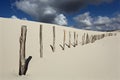 Dune with fence Royalty Free Stock Photo