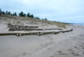 Dune fencing from weathering on the shores of the Baltic Sea.