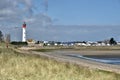 Dune and lighthouse at Ouistreham in France Royalty Free Stock Photo